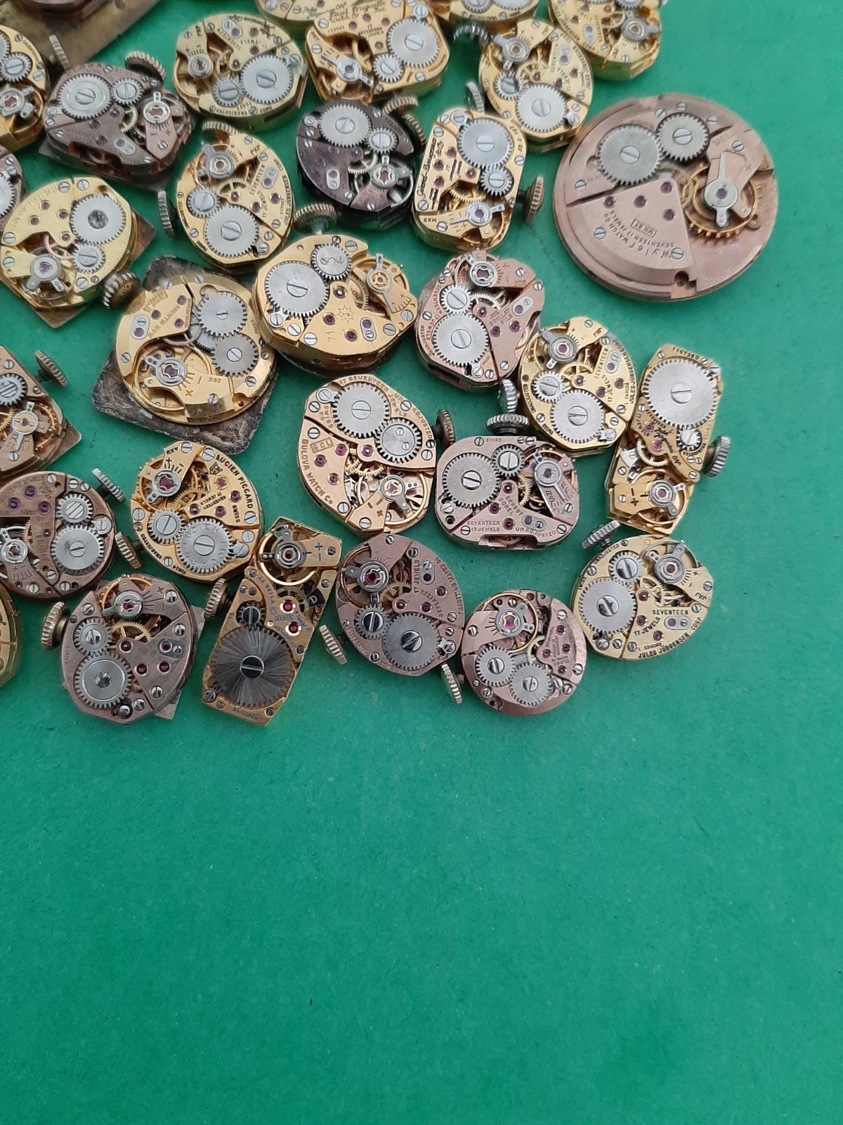 Lot of 60 Mechanical Wrist Watch Movements Parts Repair Manual Gold Cooper Tone