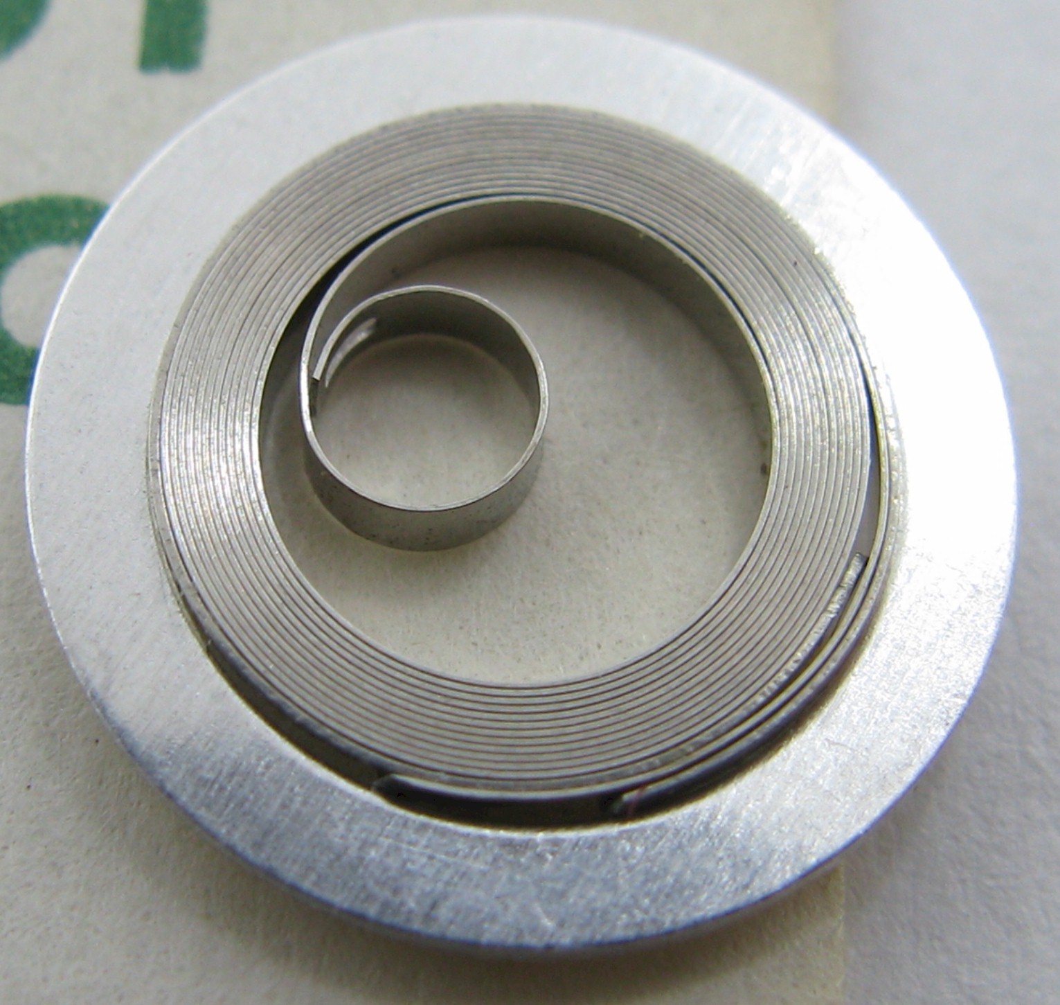 Omega Watch 330 – 333 28.10 … mainspring #771 with its bridle * white alloy *