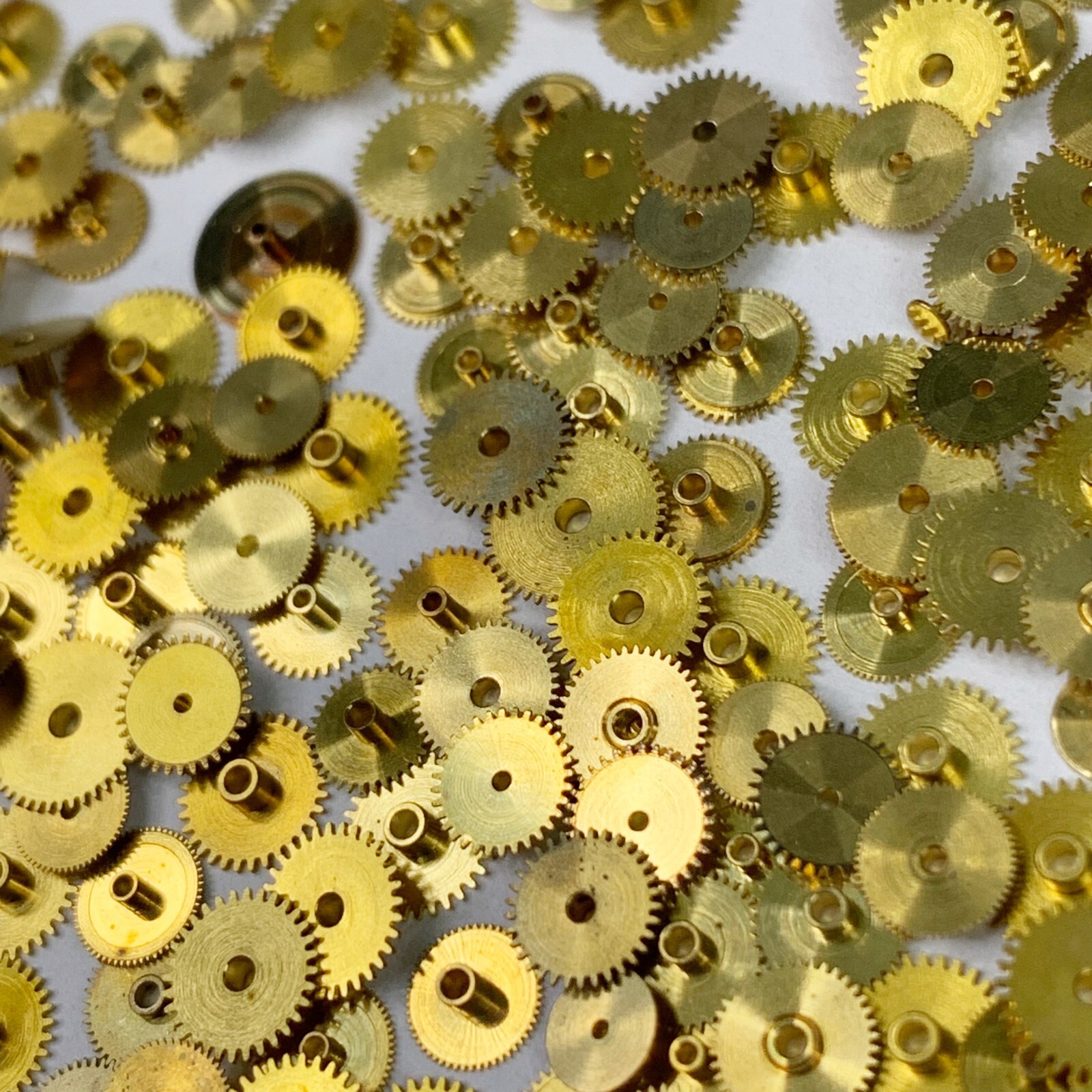 100 Gold Hour Wheels Steampunk Gears Repair Part Watchmaker Lot NOS Altered Art
