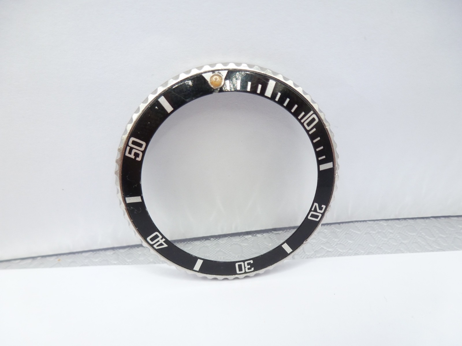 Genuine Rolex Submariner 16610/16800 complete bezel with insert vintage used .