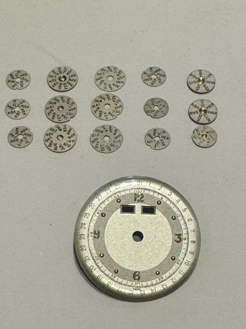 Venus 203 and other 15 various calendar discs +1 dial -calendar disk 1 dial