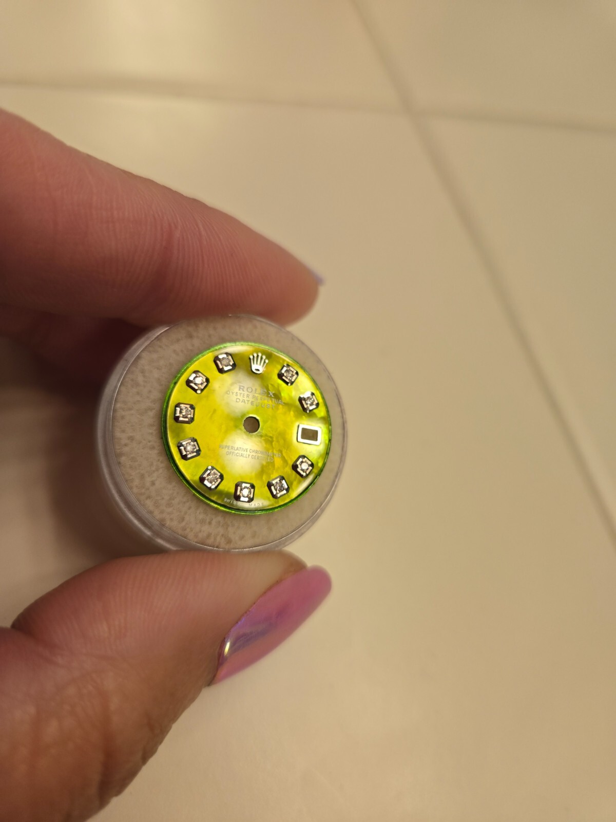 Rolex: green mother of pearl 26mm ladies datejust dial with ten diamonds