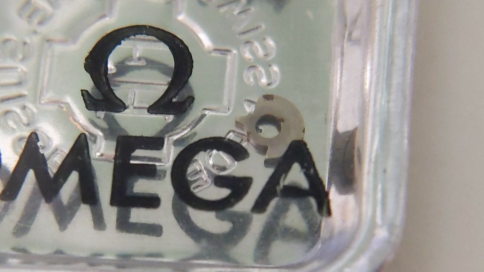 NOS Omega 260 1104 click in pack old maybe some rust – for watch repair