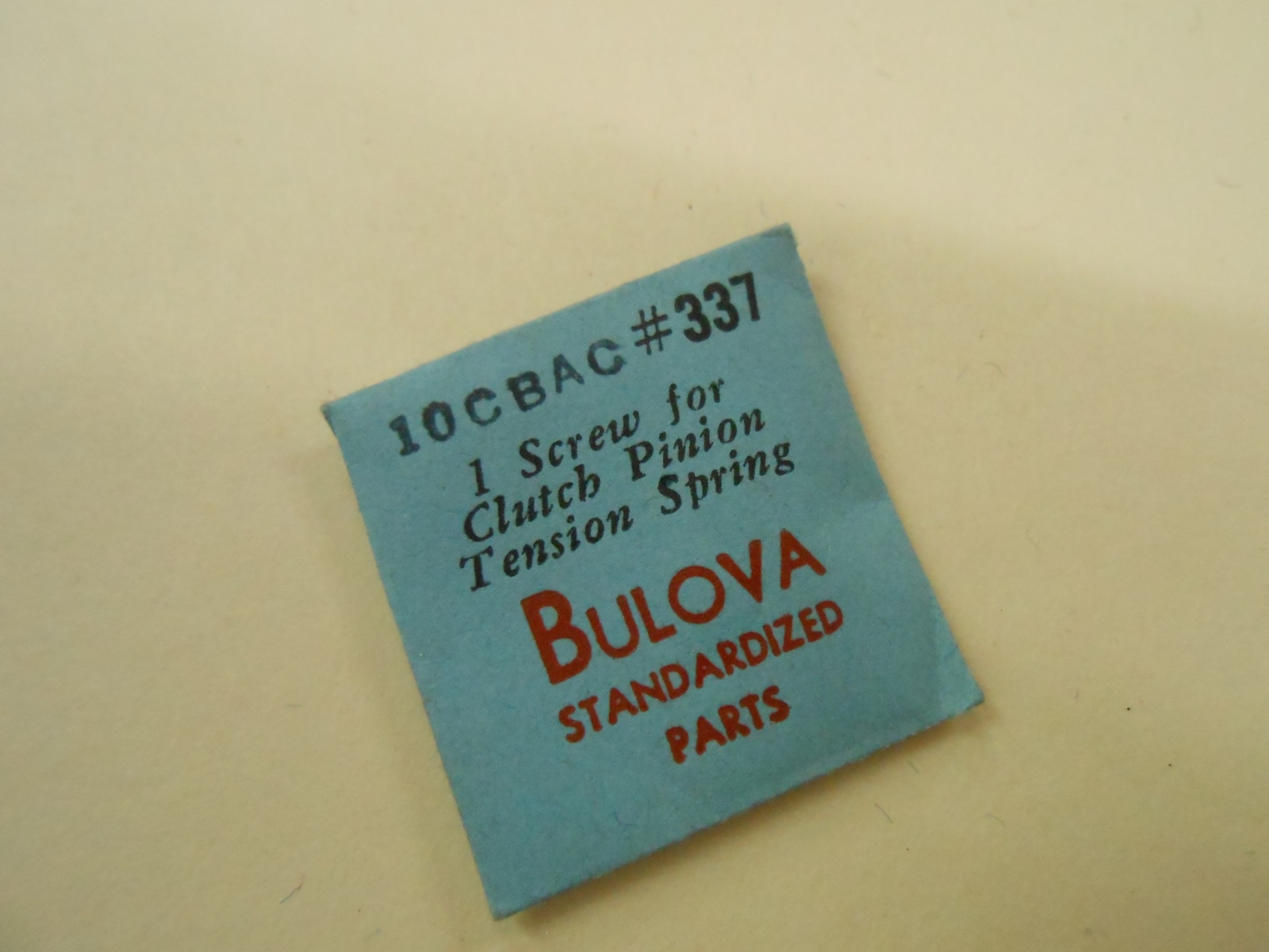 BULOVA watch part 10CBAC SCREW FOR CLUTCH PINION TENSION SPRING #337 nos