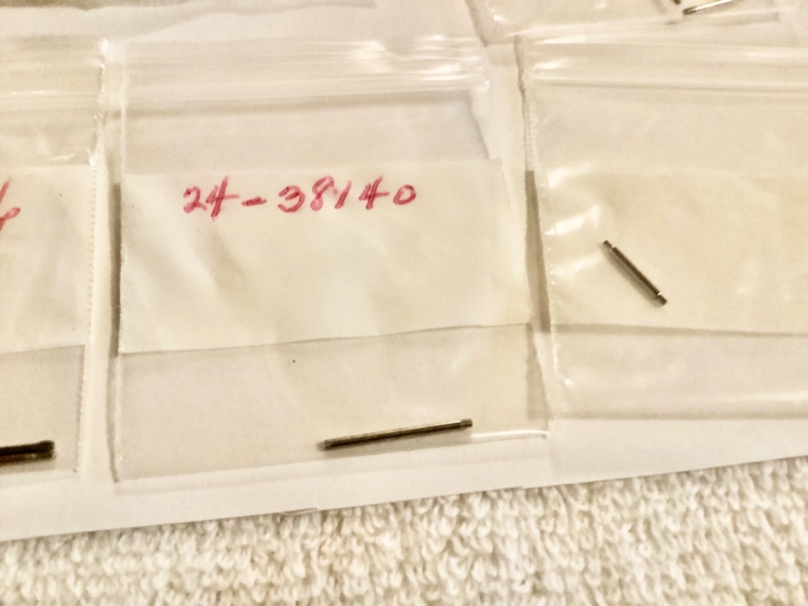 watch band pins unkown parts some with numbers