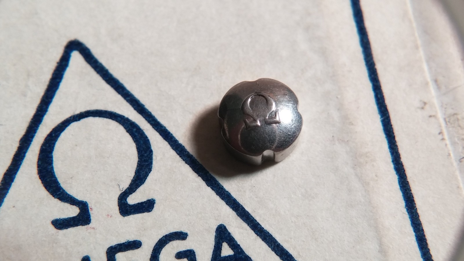 Genuine Omega 42023 clover crown 5.7mm approx diameter, cal: 8100-1016