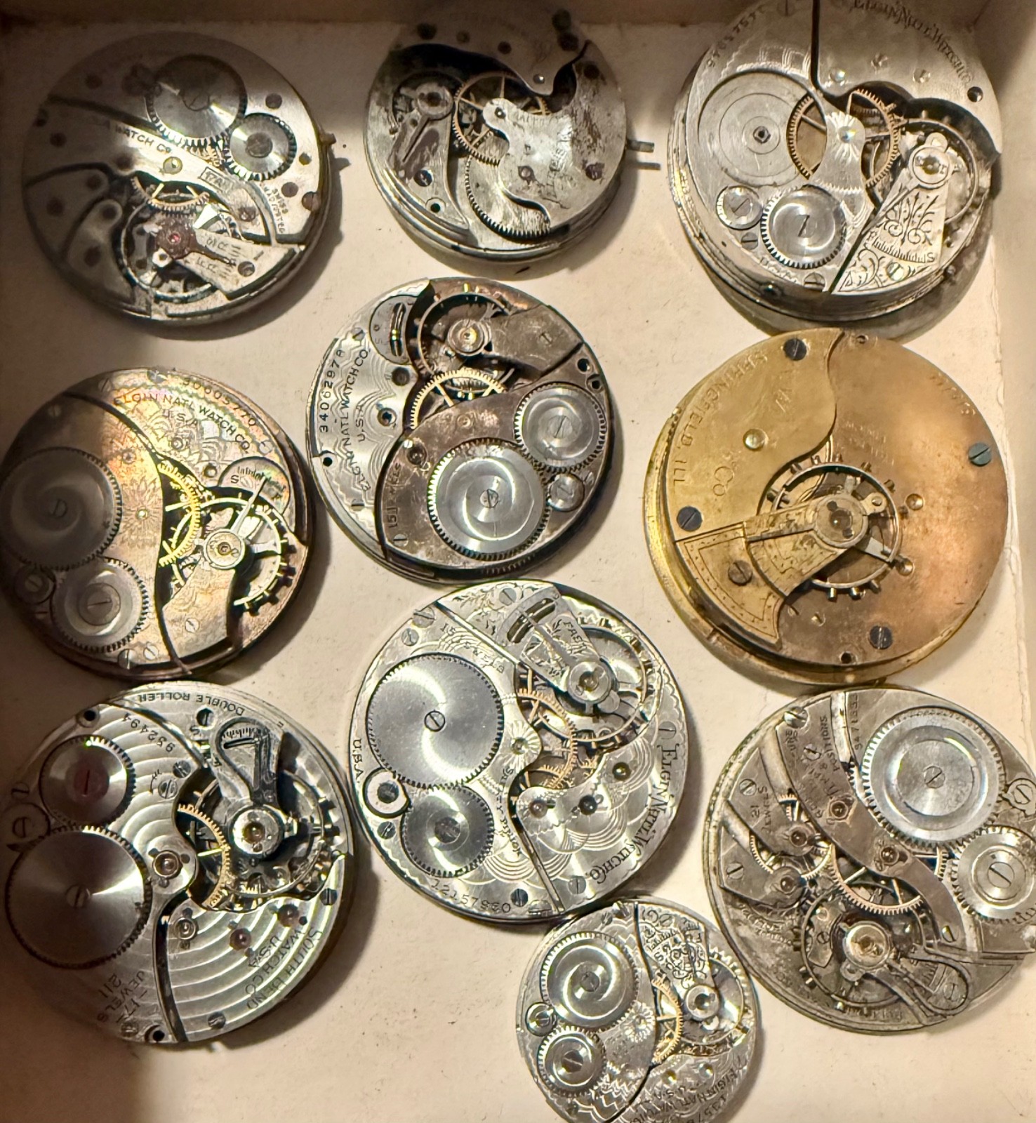 ANTIQUE LOT 10 DIFFERENT NAMES & SIZES POCKET WATCH MOVEMENT SELLING AS IS PARTS