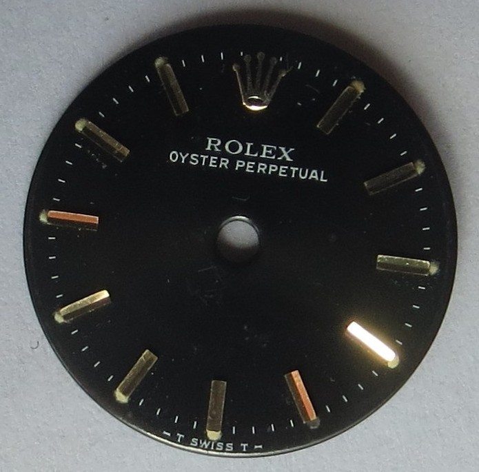Rolex Oyster Perpetual lady wristwatch black dial 18 mm. in diameter.