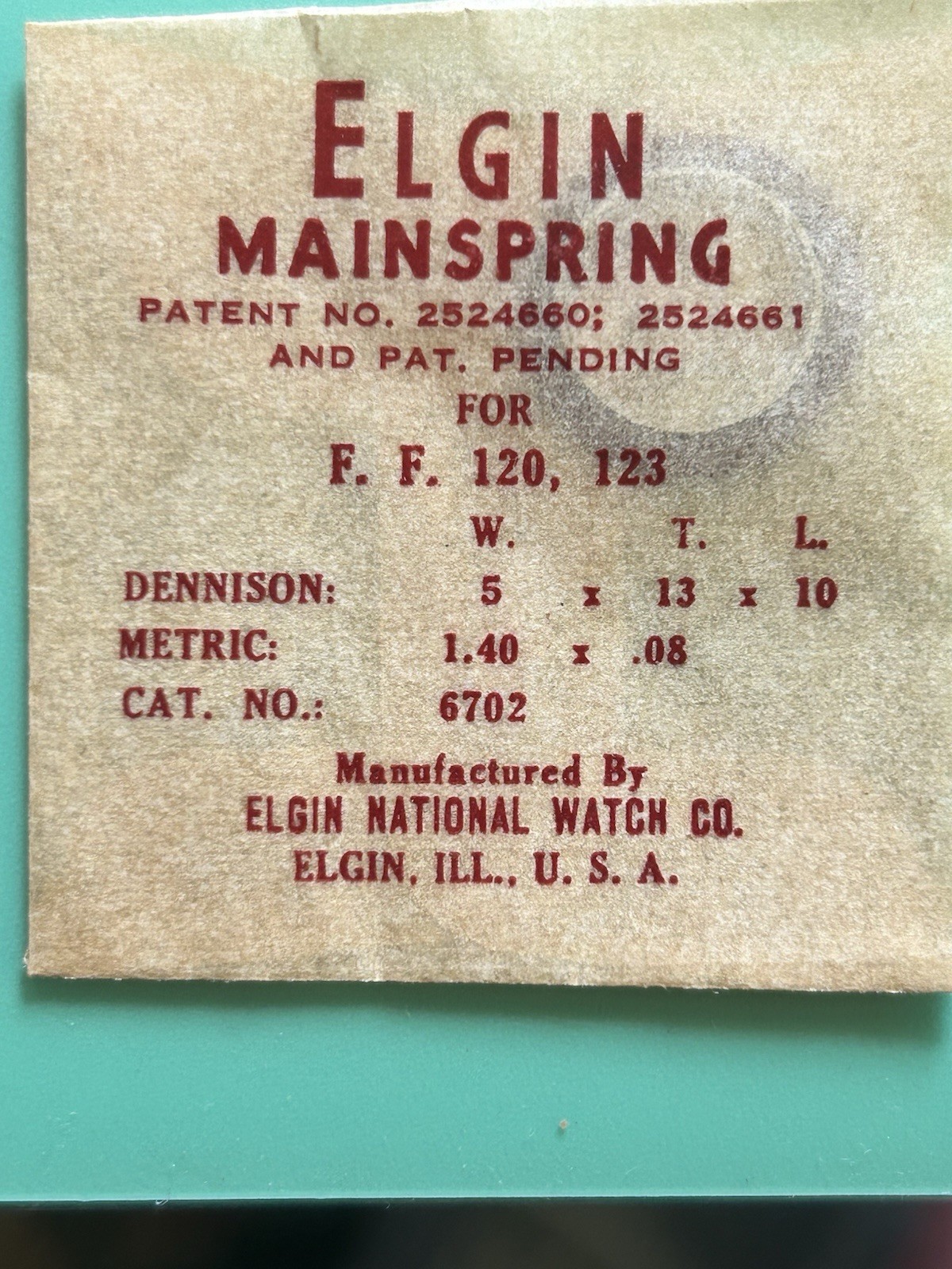 Elgin – Mainspring – Cat. #670 – 5 w x 13 t x 10 l – For F.F. 120 123 – NOS Pack