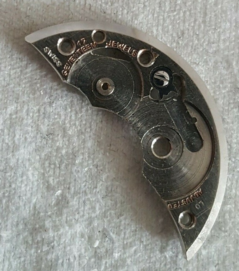 Bulova Caliber 10BC Part EB Number 105 (Barrel Bridge + Click and Screw)