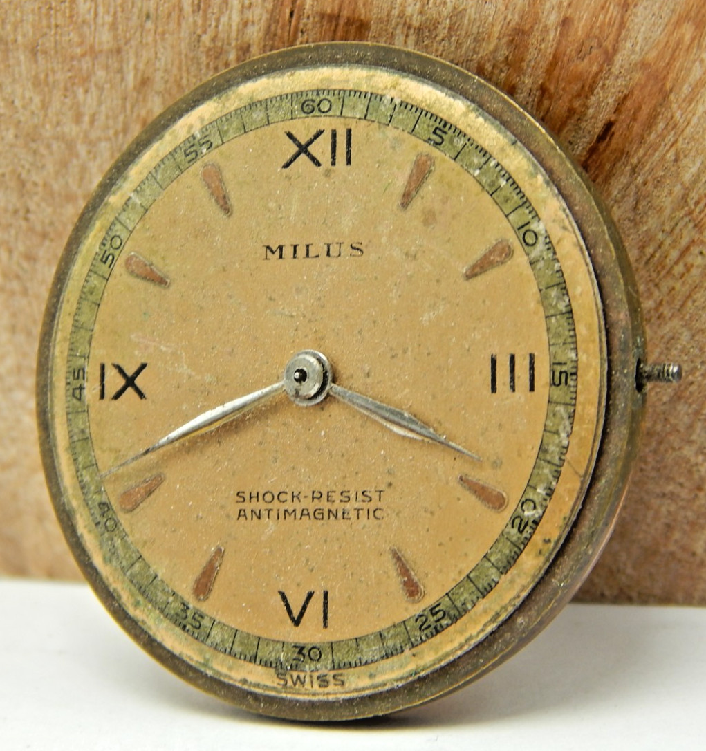 Vintage Milus 17 jewel men’s wrist watch movement with dial, hands and stem