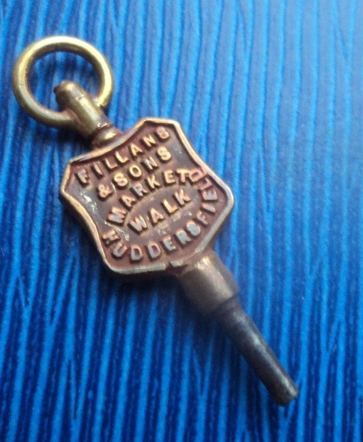 Advertising Pocket Watch Key – Fillans & Sons of Huddersfield , Yorkshire
