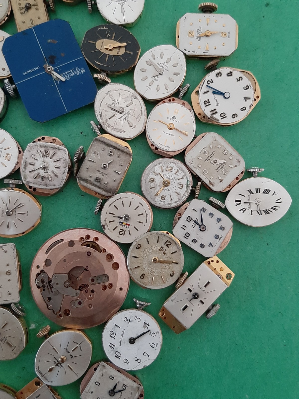 Lot of 60 Mechanical Wrist Watch Movements Parts Repair Manual Gold Cooper Tone