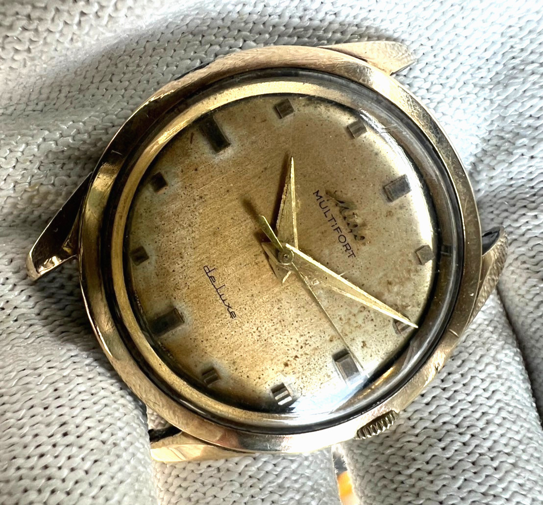92. Mido Multifort Deluxe 35.5mm running gold cap sell as part cal 1200 C