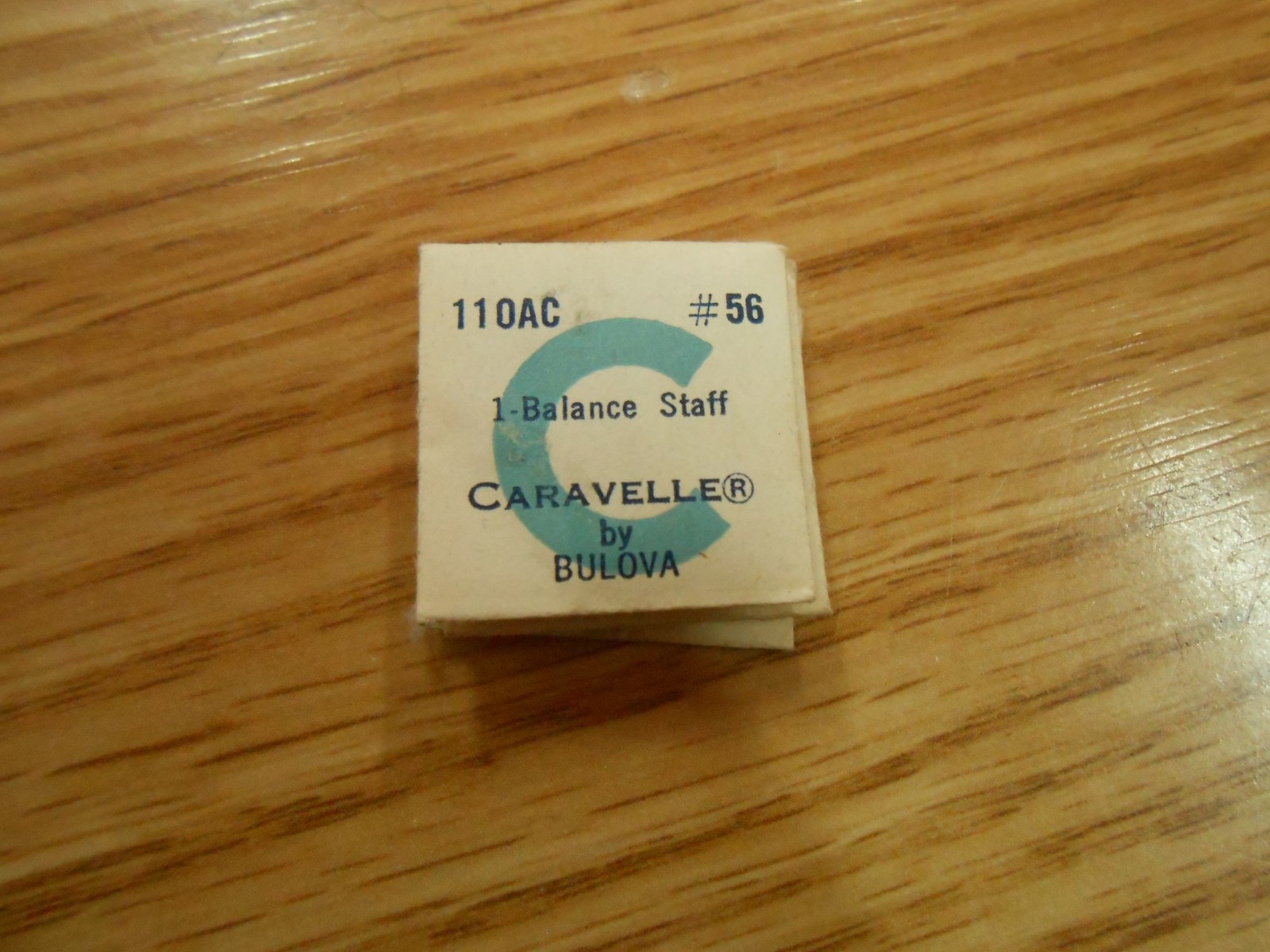 BULOVA CARAVELLE watch part 11OAC #56 1 BALANCE STAFF