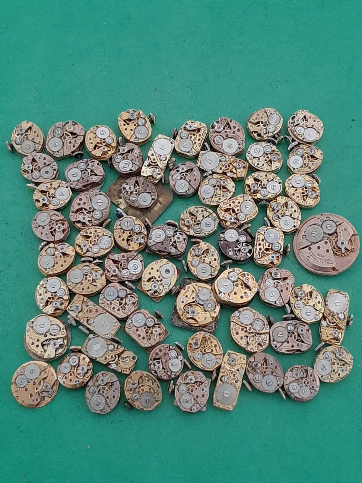 Lot of 60 Mechanical Wrist Watch Movements Parts Repair Manual Gold Cooper Tone