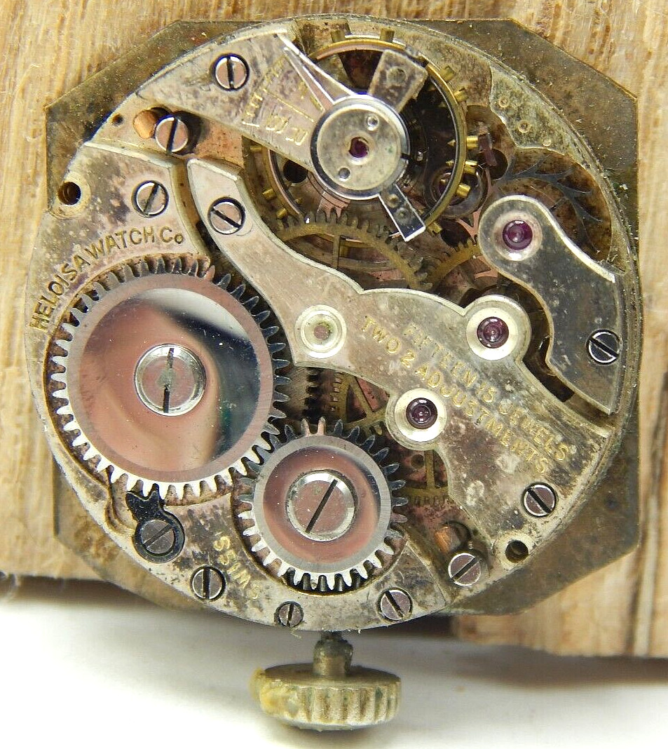 Vintage Heloisa 15 jewel 2 adjustment watch movement with dial and crown / stem