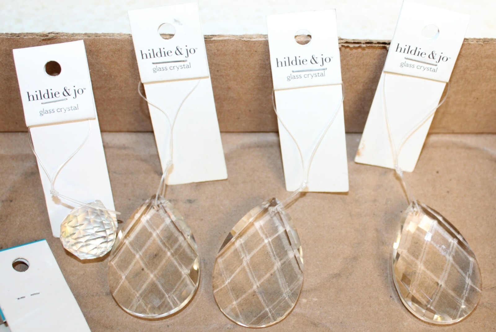 J) Lot of 7 Hildie & Jo® Genuine Hand Cut Crystals in Various Shapes & Sizes