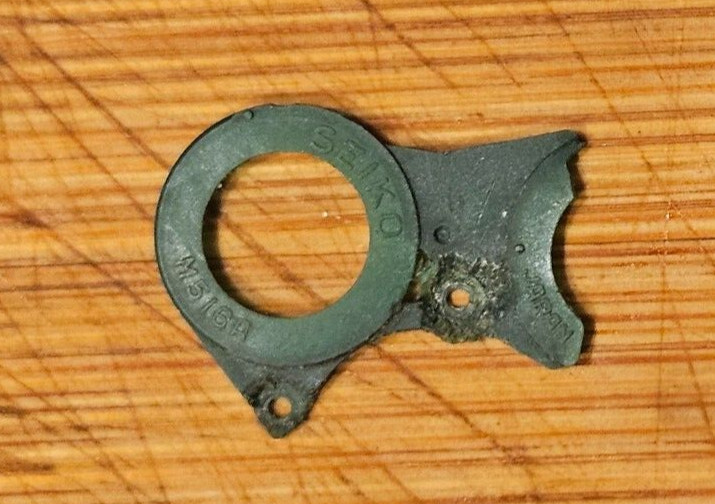 Genuine SEIKO M516 part Battery Clip Holder for GHOSTBUSTERS watch Original Part