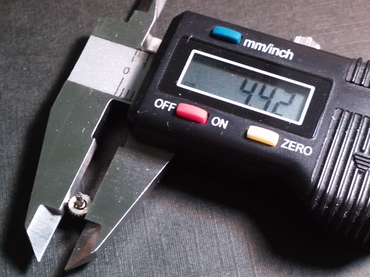 Genuine Omega crown 4.3-4.5mm approx. WHITE, split medium stem, for watch repair