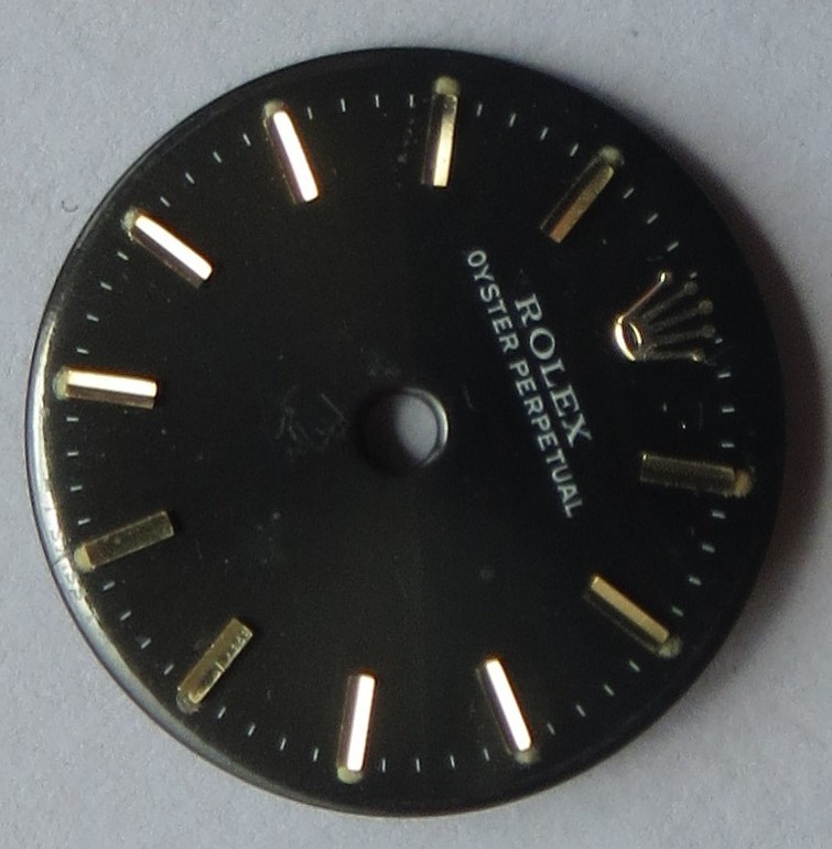 Rolex Oyster Perpetual lady wristwatch black dial 18 mm. in diameter.