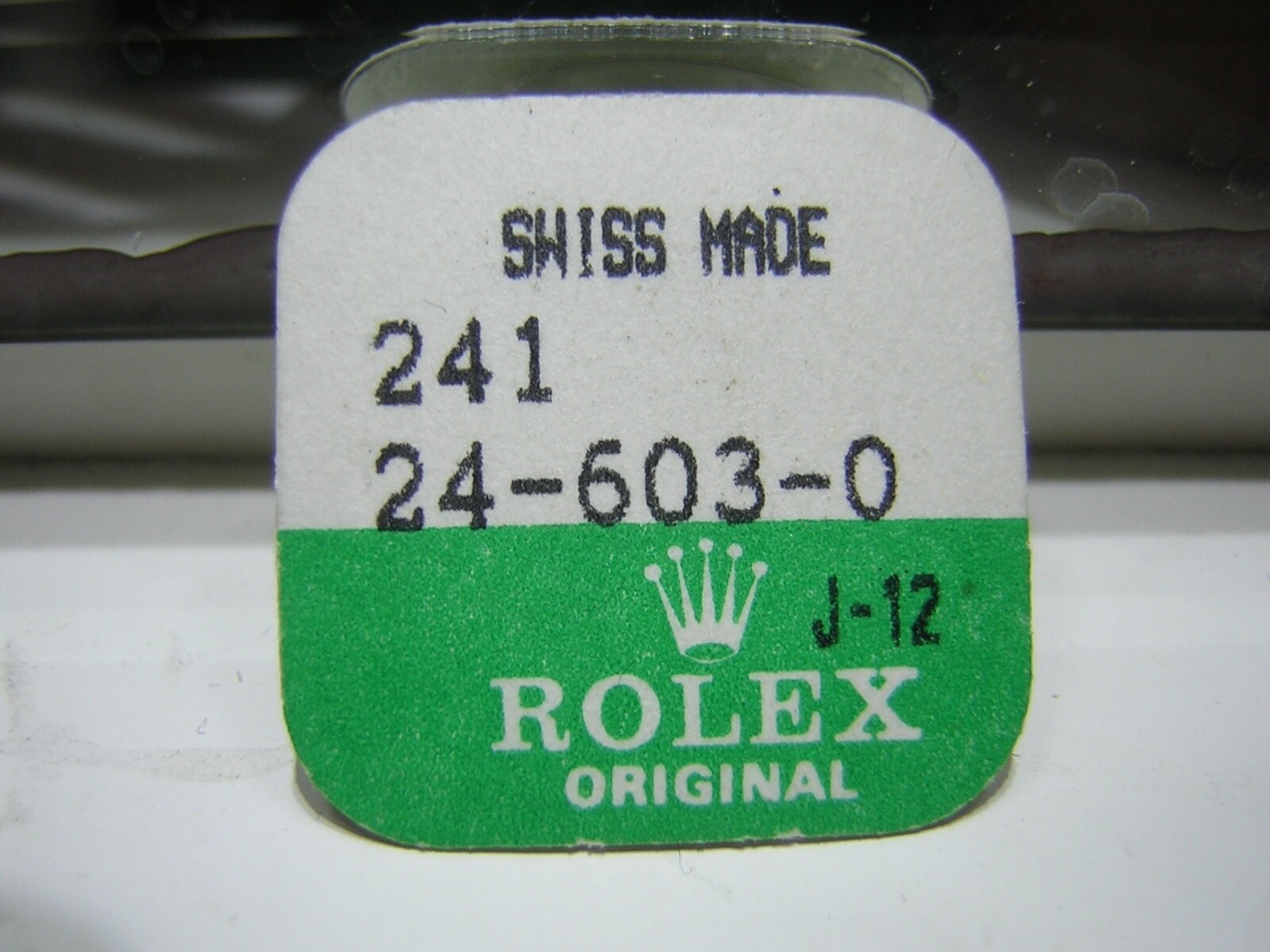 New Original Rolex Crown 24-603-0 Stainless Steel in sealed package.