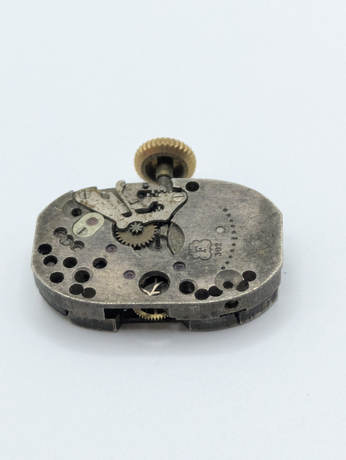 F302 Milus 15 Jewel Manual Watch Movement Swiss Made No Dial Untested 15.1mm