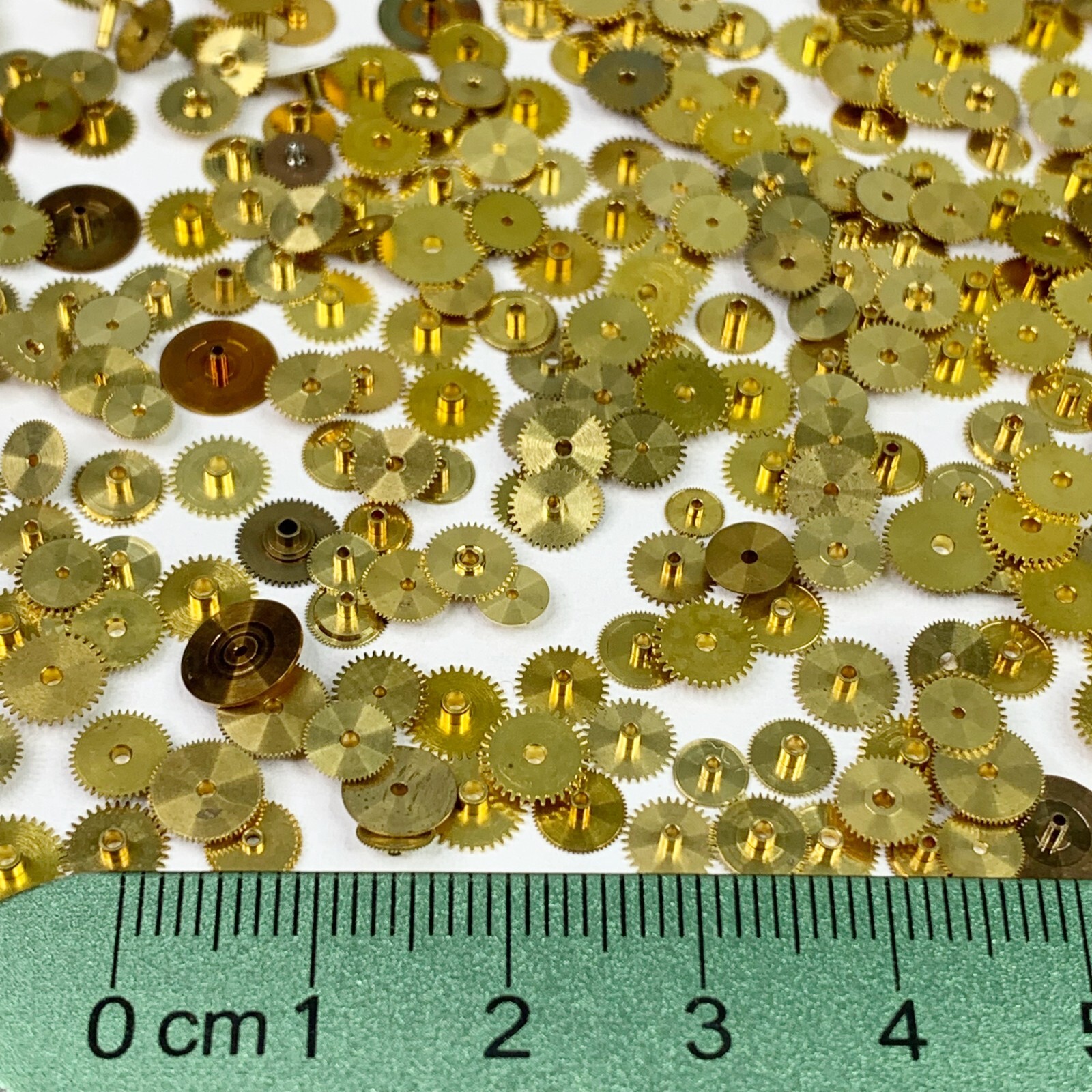 100 Gold Hour Wheels Steampunk Gears Repair Part Watchmaker Lot NOS Altered Art