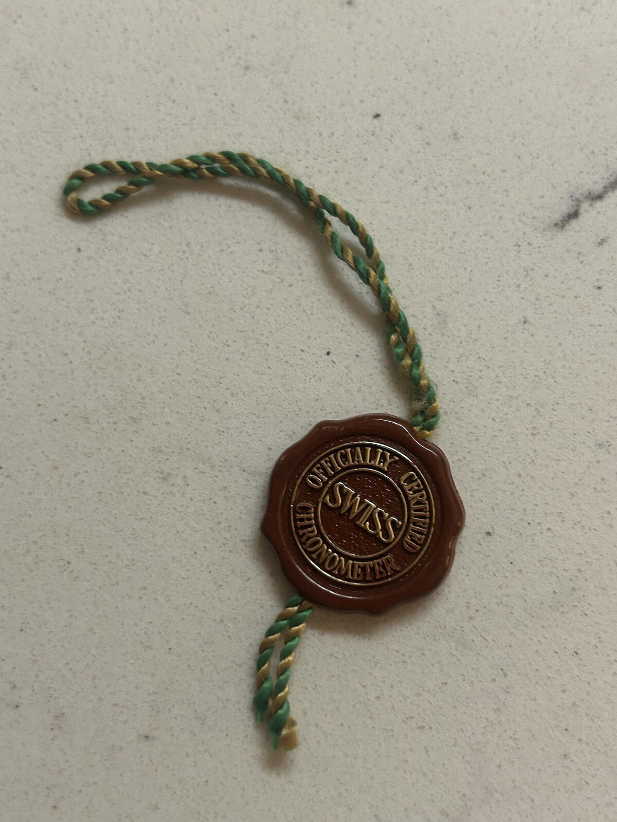 ROLEX Burgundy Hologram Hang Tag Swiss Officially Certified Chronometer