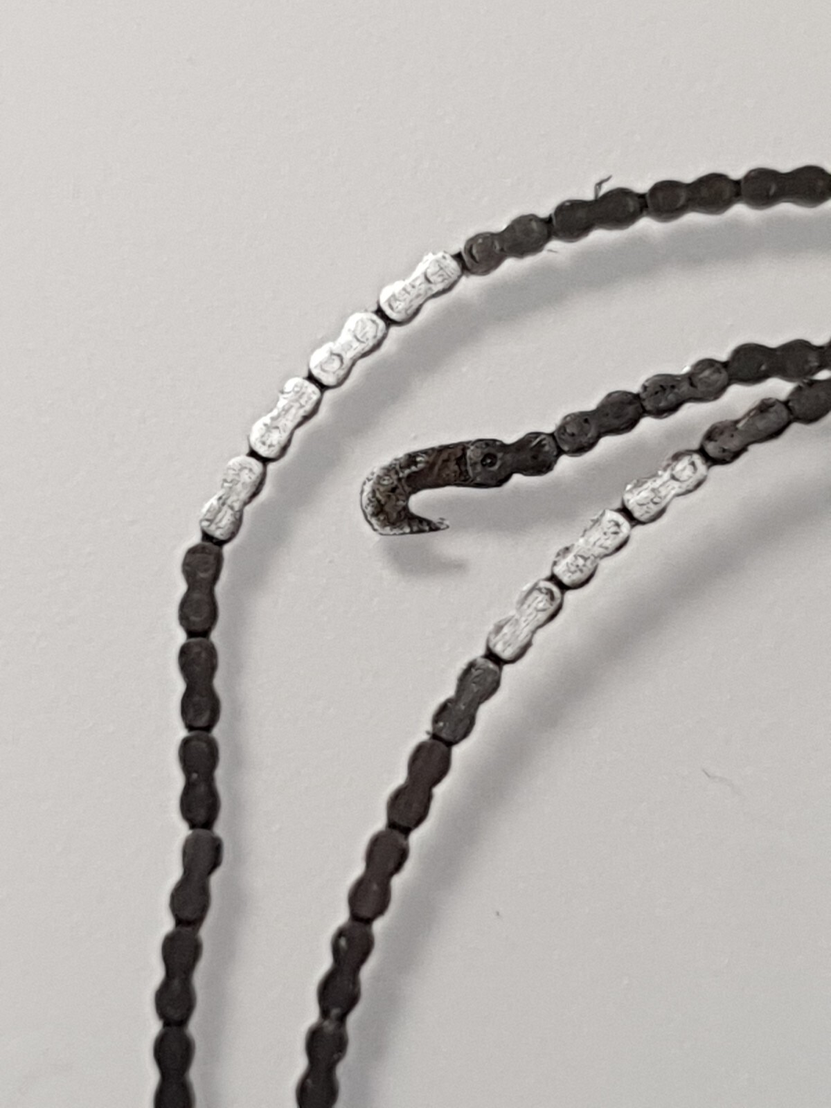 Fusee pocket watch chain. Length 145 mm thickness of 0.25 height of 0.5 mm