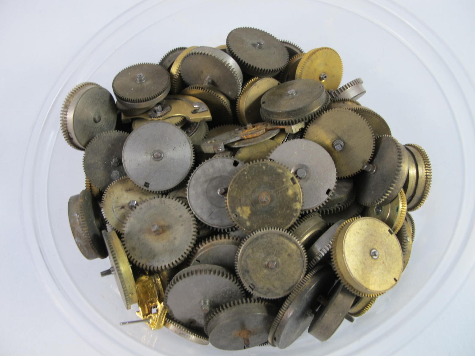ANTIQUE GROUP OF MAINSPRING BARRELS AND BRIDGES FOR OLD POCKET WATCHES 89 PIECES