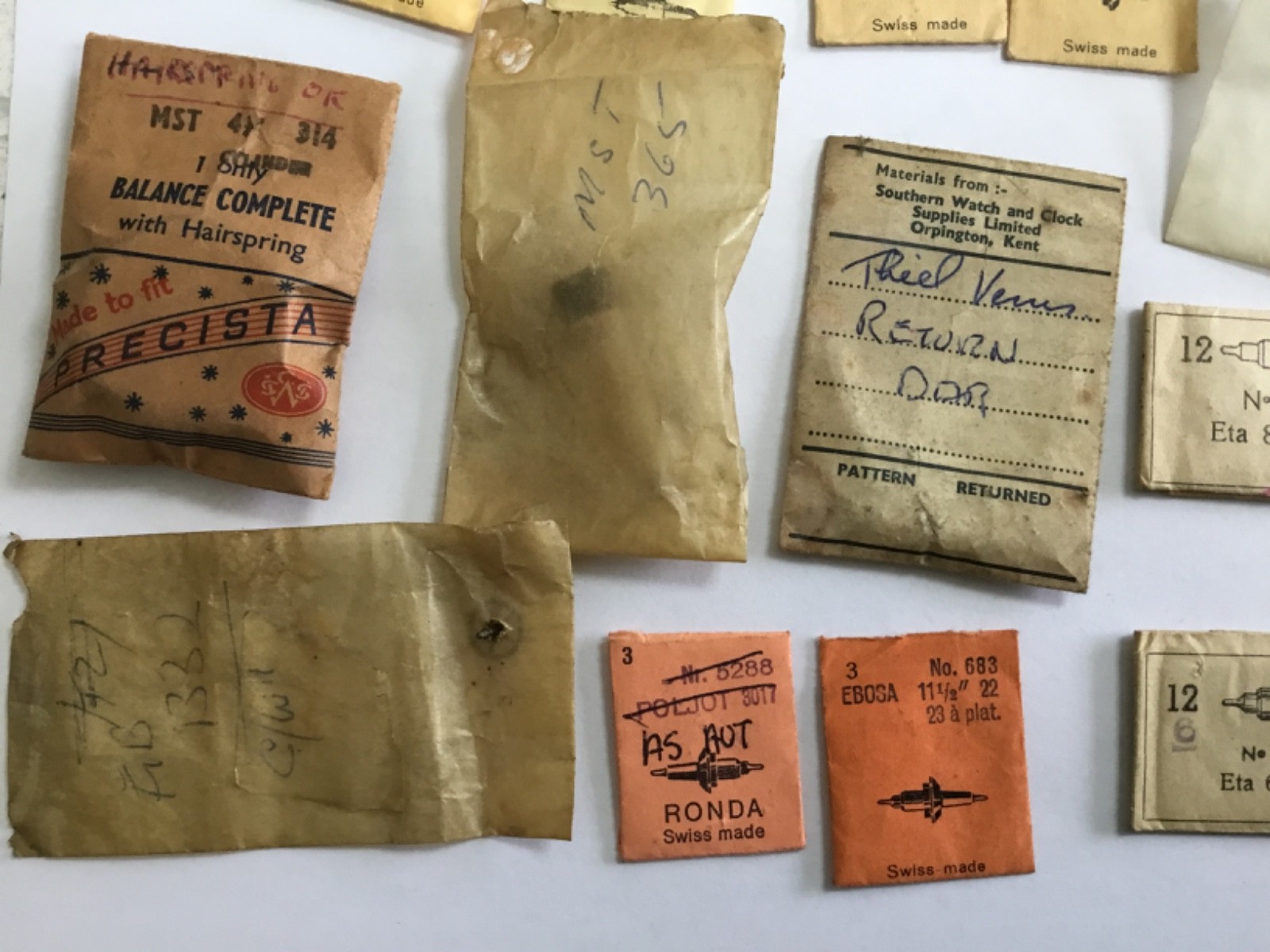 joblot vintage NOS Ronda dcn watch balance staff packets and other parts