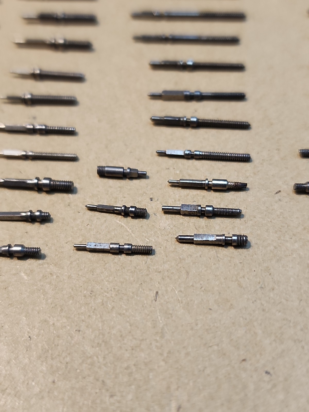 Lot Of 56 Mixed Wristwatch Winding/Setting Stems-Variety Of Types And Tap Sizes