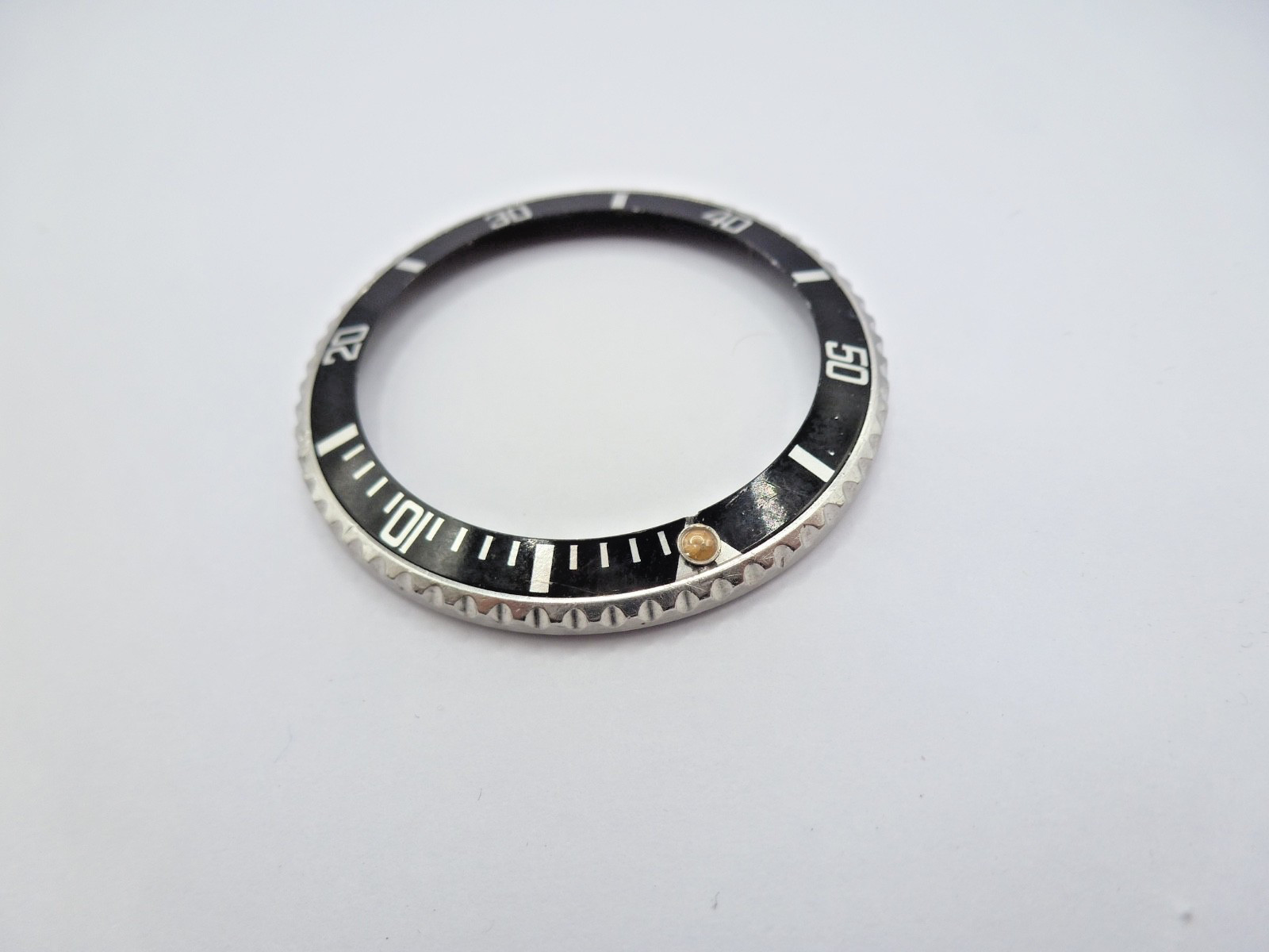 Genuine Rolex Submariner 16610/16800 complete bezel with insert vintage used .
