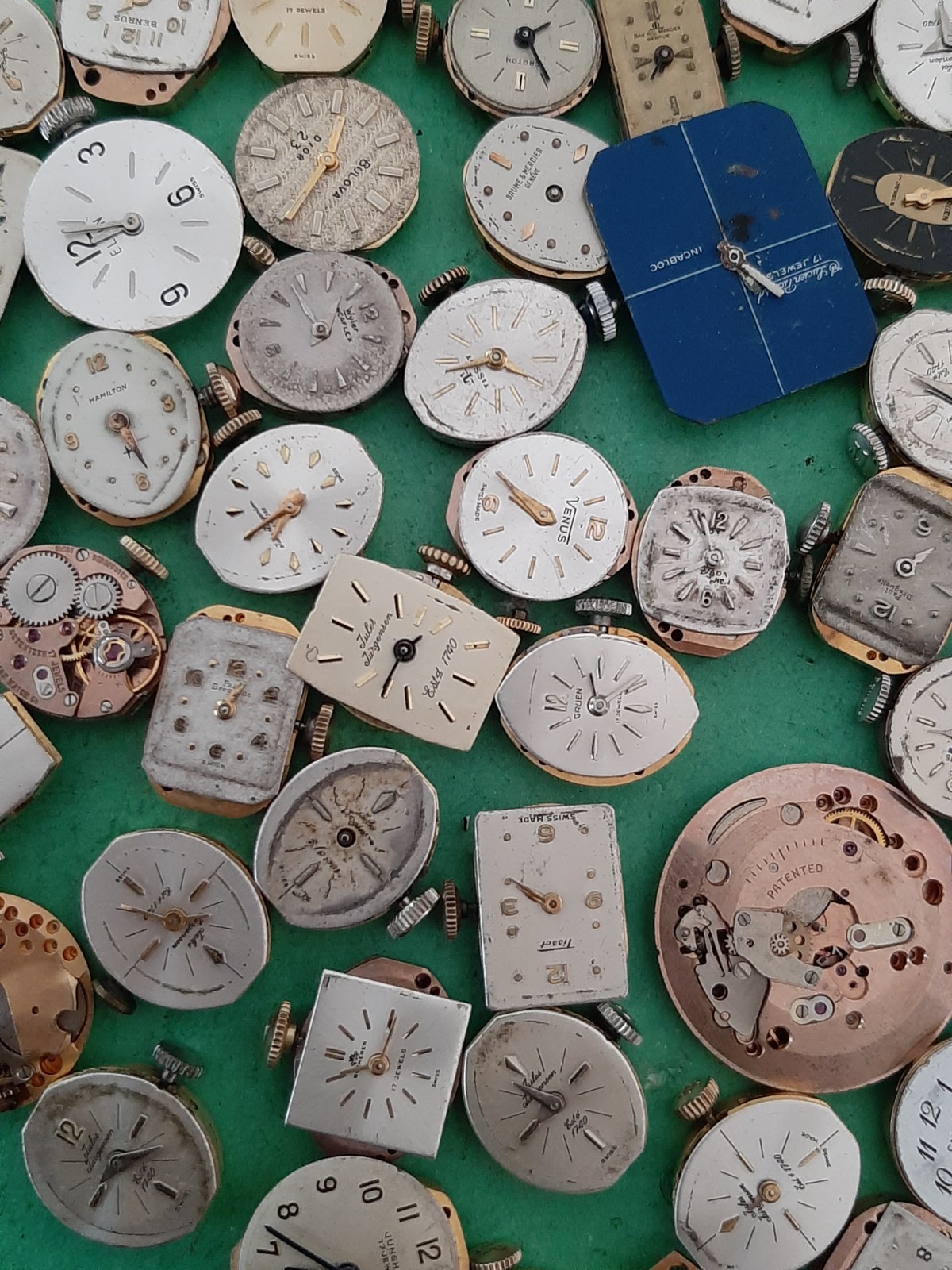 Lot of 60 Mechanical Wrist Watch Movements Parts Repair Manual Gold Cooper Tone