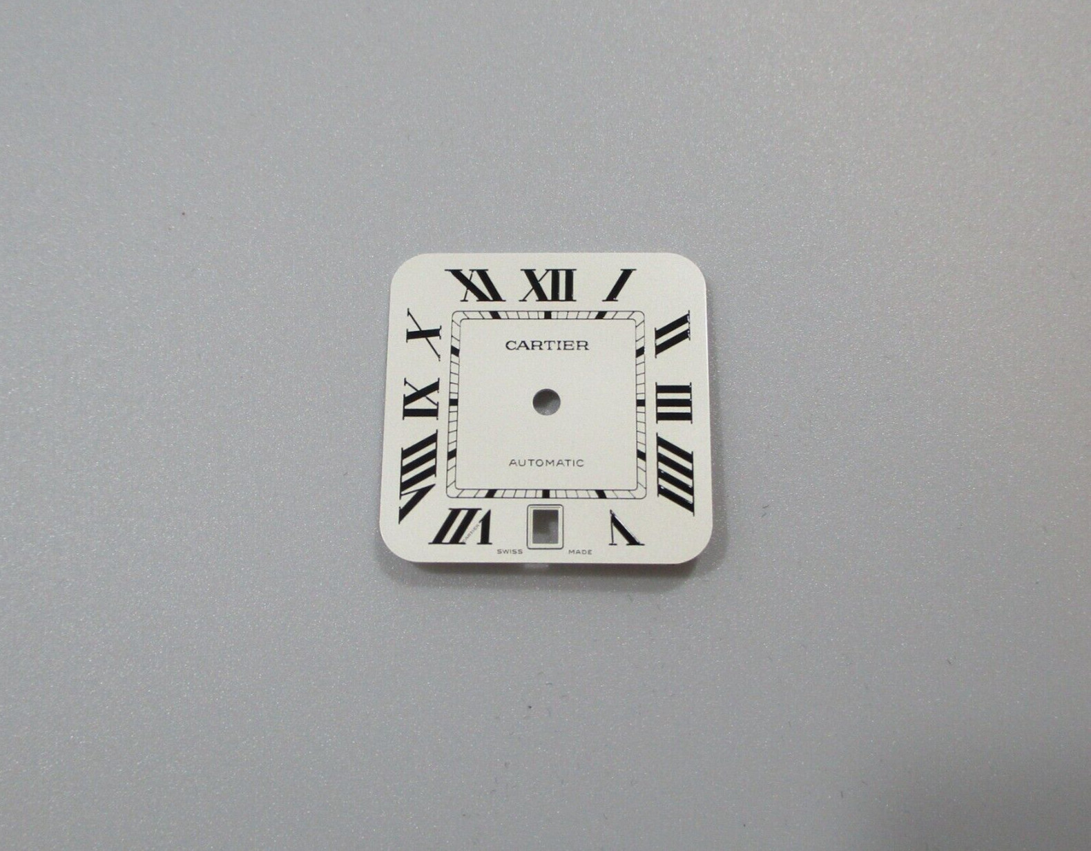 Cartier Santos White Dial Black Roman 40mm Men’s Automatic Steel Ref. WSSA0018?