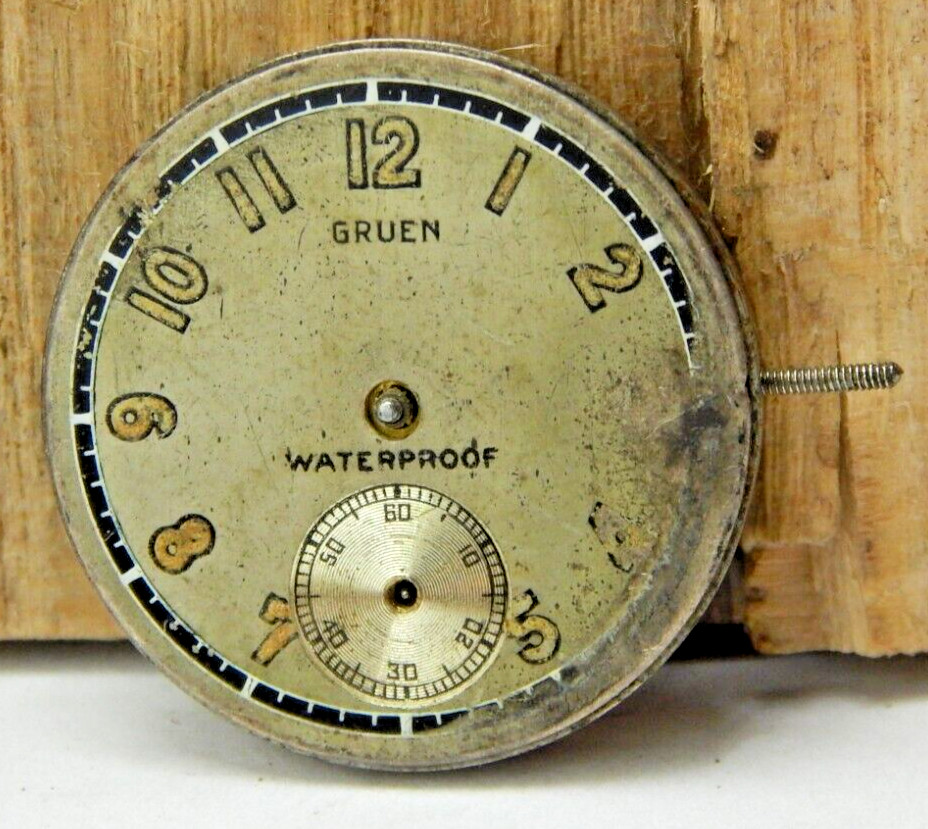 Vintage Gruen 15 Jewel 3 Adjustment 8/0 size watch movement with dial and stem