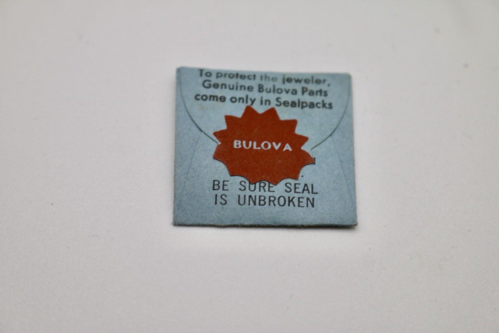 BULOVA watch part 11AF #31 1-CLICK SPRING Blue Sealpack Paper for Bulova