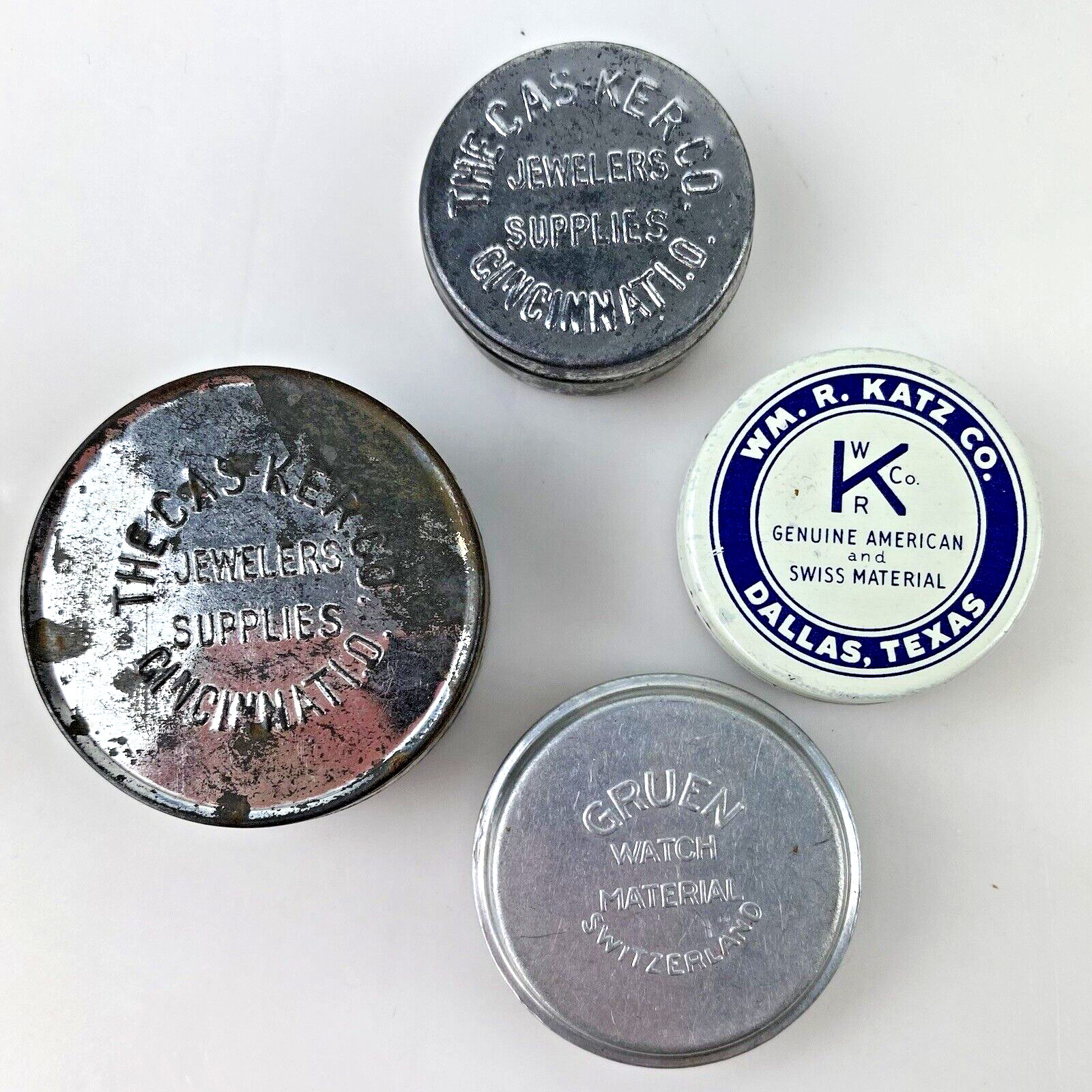 LOT 4 JEWELERS WATCH TINS Gruen Casker Katz Parts Texas Switzerland Ohio Vtg