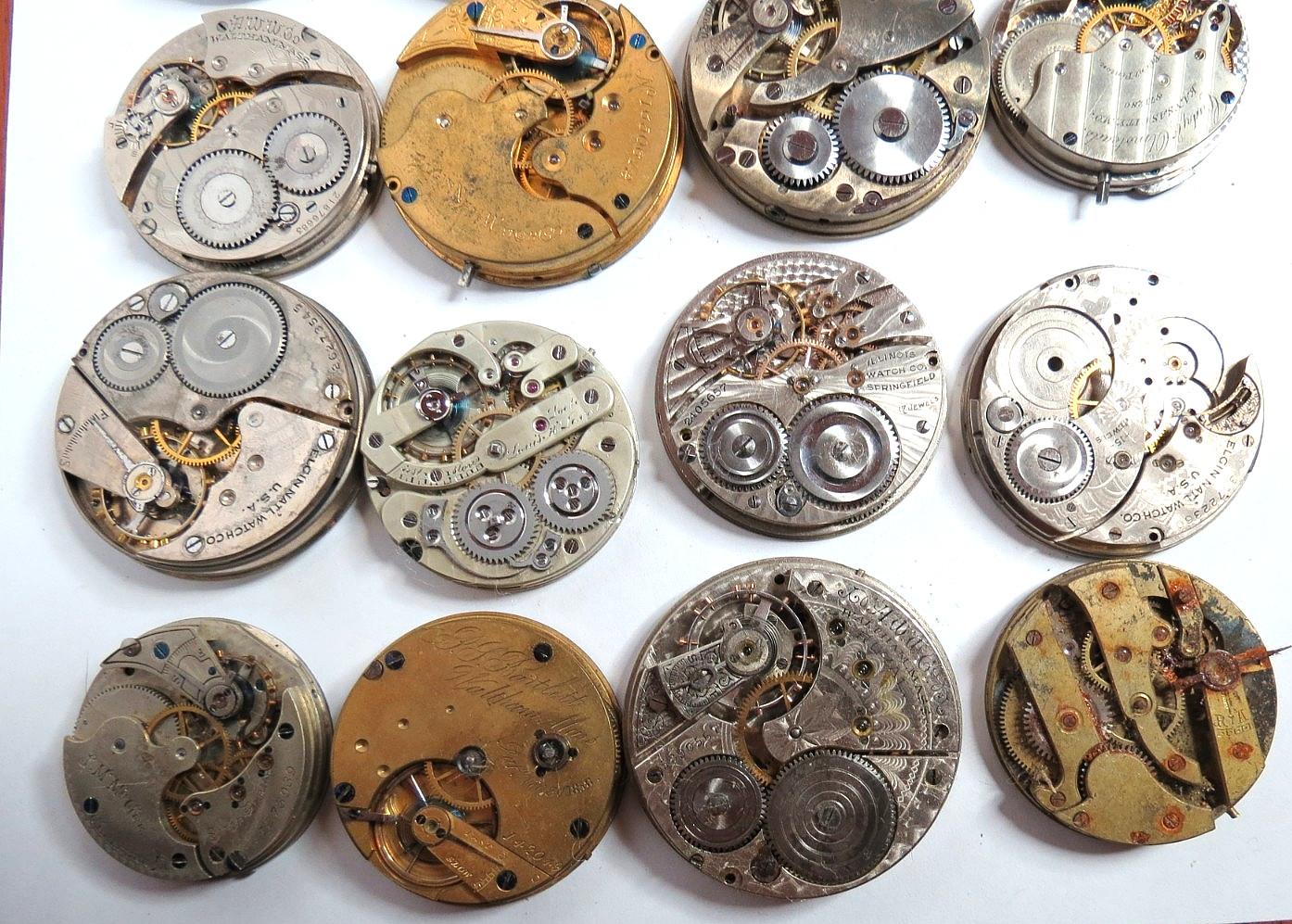 ANTIQUE LOT 16 DIFFERNT NAMES & SIZES POCKET WATCH MOVEMENT SELLING AS IS PARTS