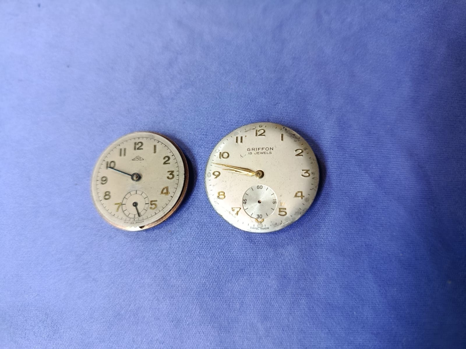 As1203 watch movements Job lot of 2. Approx. 26.7mm both.ticking Swiss