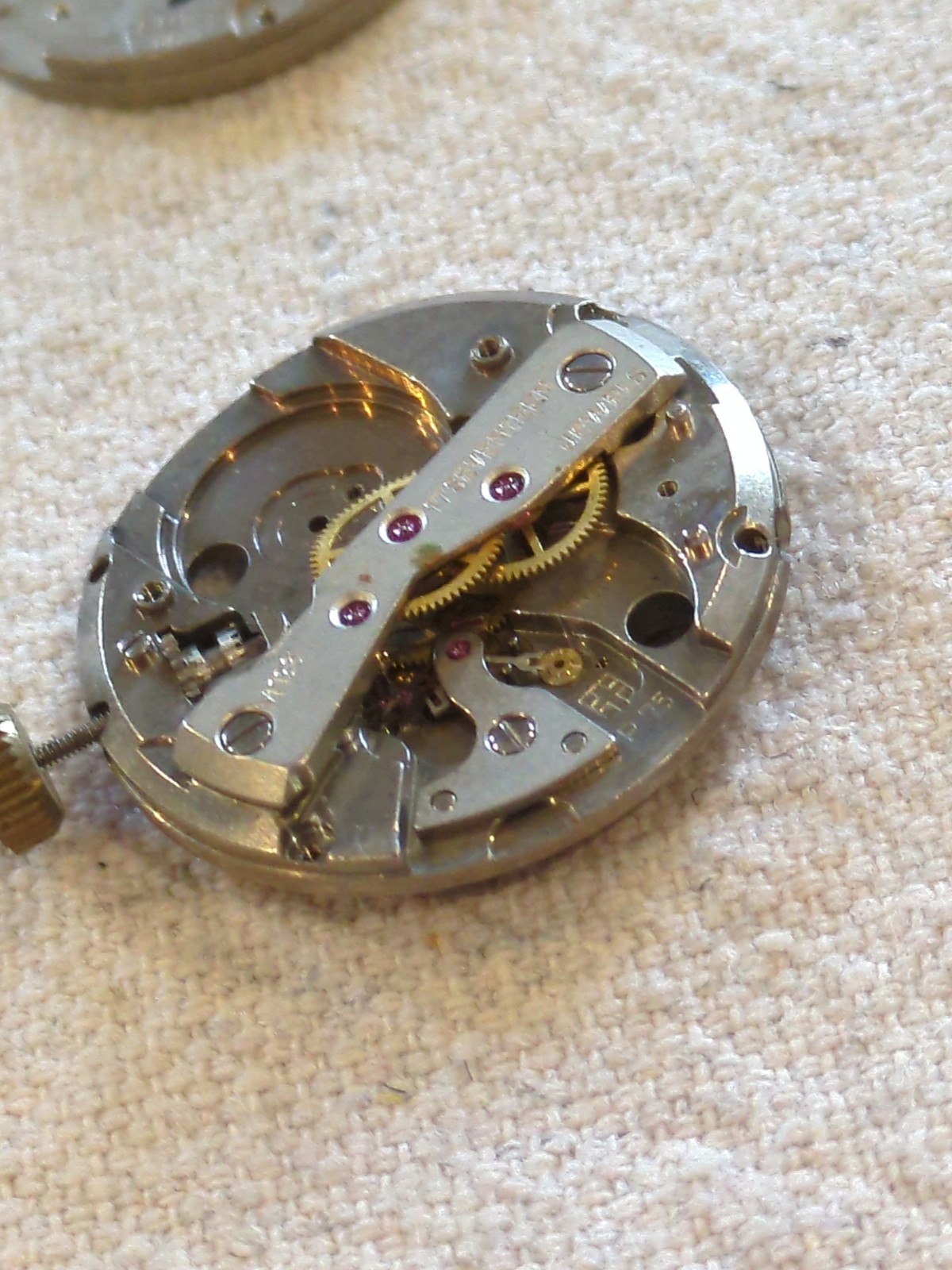 !Lot of 2 watch movements with a Box, Wheels, Plates, Screws, Springs, and more!