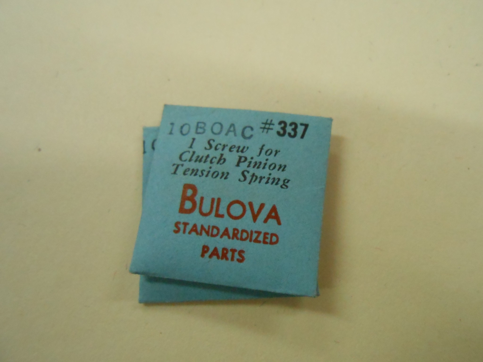 BULOVA watch part 10BOAC SCREW FOR CLUTCH PINION TENSION SPRING #337 NOS