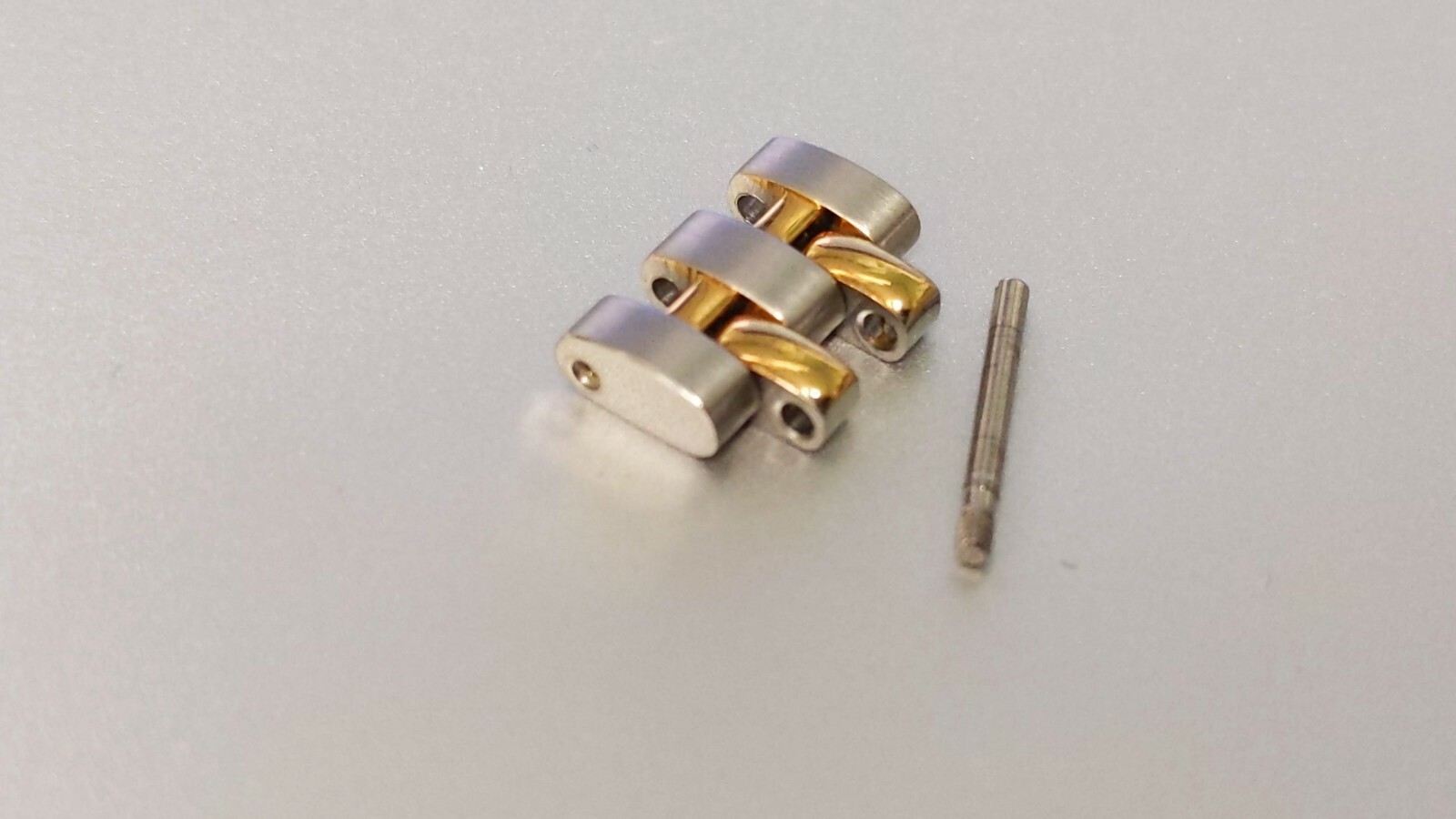 OMEGA LINKS S/S and Yellow 12mm x 6.9mm great condition. for watch repair