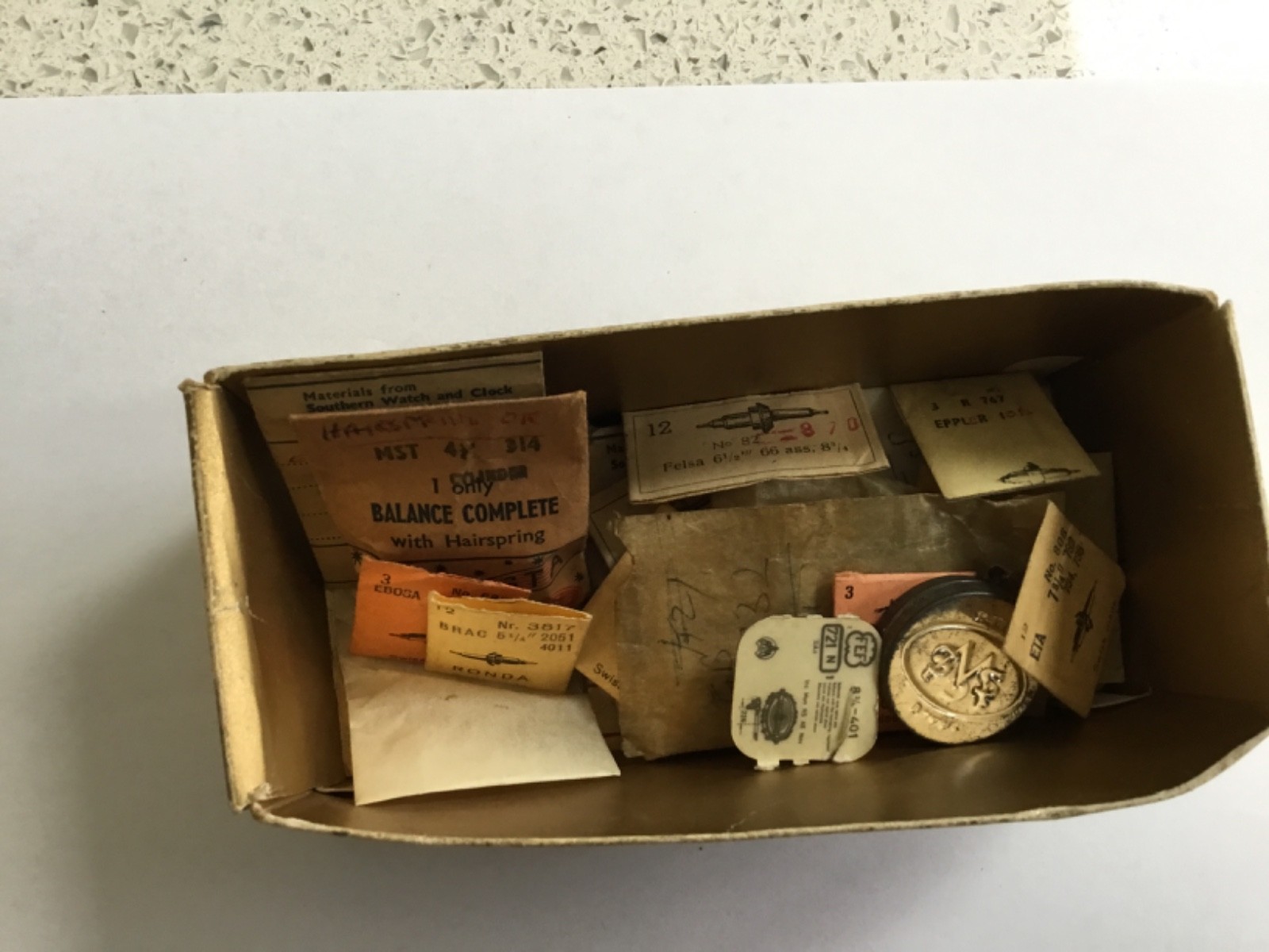 joblot vintage NOS Ronda dcn watch balance staff packets and other parts
