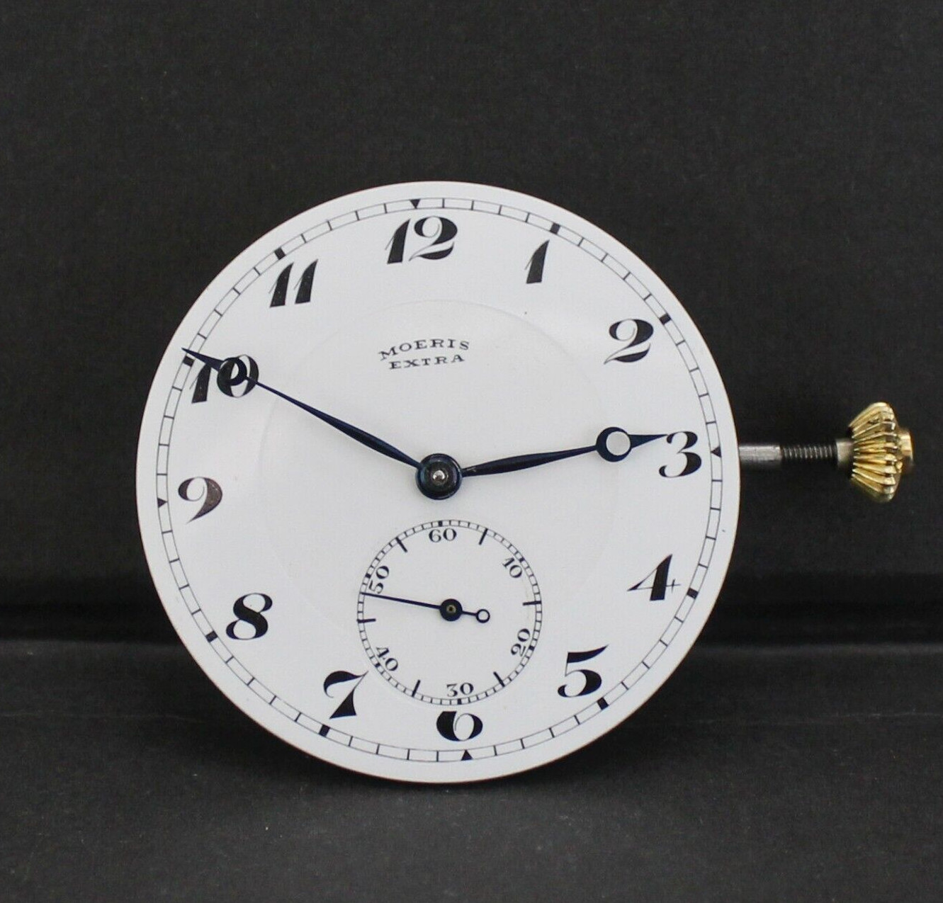 Antique Moeris manual Movement, dial, hands, winding stem & crown . Running!!