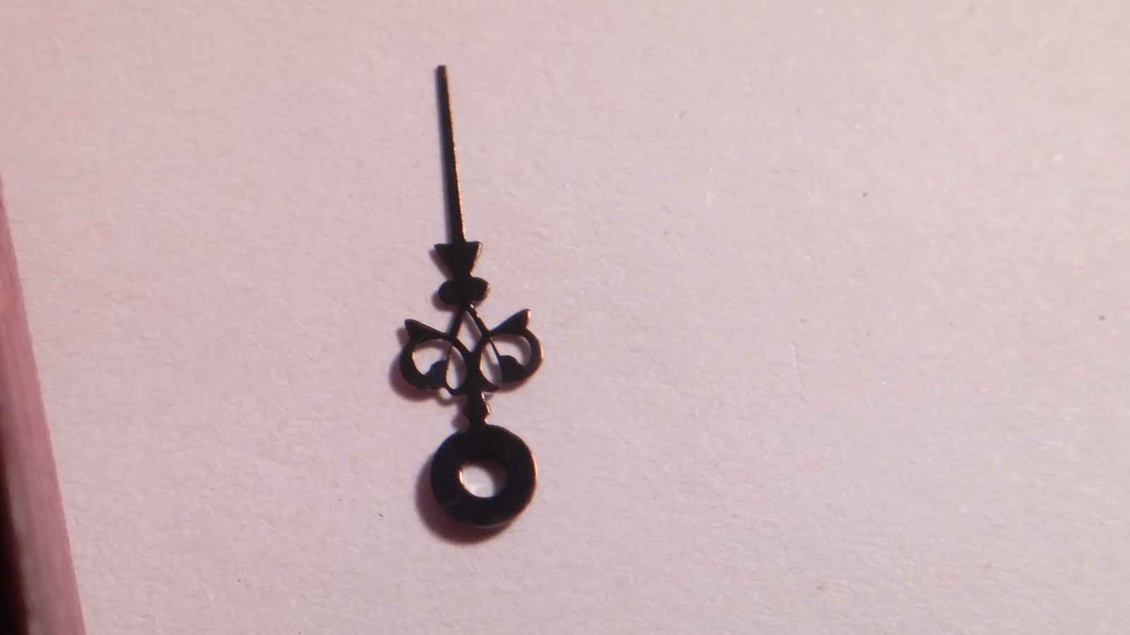 Louis XIV hand BLACK, 12mm from bottom of circle. 130/32. 246