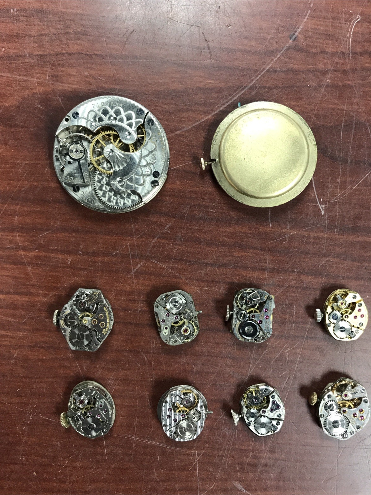 “LOT OF 15 VINTAGE WATCH MECHANISMS, FOR PARTS”