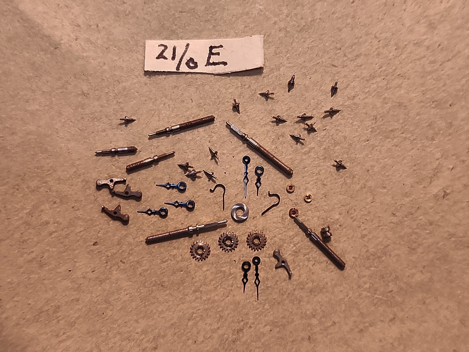 Lot Of NOS Elgin 21/0 Mixed Parts-Stems, Balance Staffs, Jewels, Hands, Etc