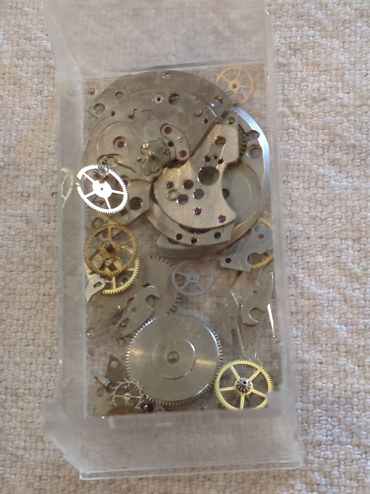 !Lot of 2 watch movements with a Box, Wheels, Plates, Screws, Springs, and more!